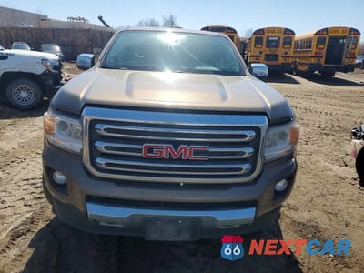 Piąte zdjęcie samochodu w środku: 2016 GMC CANYON SLT VIN:1GTG6DE38G1261243 - miniatura