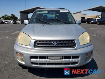 Piąte zdjęcie samochodu w środku: 2003 TOYOTA RAV4 BASE VIN:JTEGH20V730094005 - miniatura