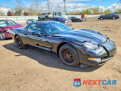 Czwarte zdjęcie samochodu z boku: 2004 CHEV CORVETTE VIN:1G1YY22G645111624 - miniatura