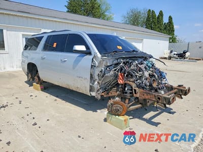 Czwarte zdjęcie samochodu z boku: 2015 GMC YUKON XL K1500 SLT VIN:1GKS2HKC4FR611389 - miniatura