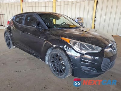 Czwarte zdjęcie samochodu z boku: 2013 HYUNDAI VELOSTER BASE VIN:KMHTC6AD2DU165180 - miniatura