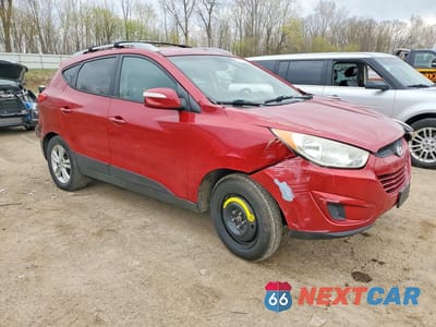 Czwarte zdjęcie samochodu z boku: 2012 HYUNDAI TUCSON GLS VIN:KM8JU3ACXCU443154 - miniatura