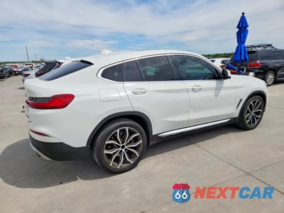 Trzecie zdjęcie samochodu z tyłu: 2021 BMW X4 XDRIVE30I VIN:5UX2V1C03M9H38079 - miniatura