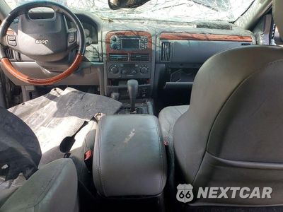 Zdjęcie 8 z 13 samochodu: 2003 JEEP GRAND CHEROKEE OVERLAND VIN:1J8GW68J33C611908 - miniatura