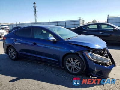 Czwarte zdjęcie samochodu z boku: 2018 HYUNDAI ELANTRA VALUE EDITION VIN:5NPD84LF5JH301384 - miniatura