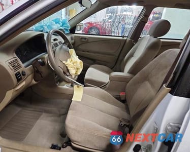 Zdjęcie 7 z 12 samochodu: 2001 TOYOTA COROLLA LE VIN:1NXBR12E31Z536282 - miniatura
