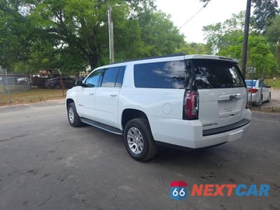 Trzecie zdjęcie samochodu z tyłu: 2020 GMC YUKON XL C1500 SLT VIN:1GKS1GKC5LR286809 - miniatura