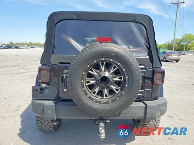 Zdjęcie 6 z 13 samochodu: 2014 JEEP WRANGLER UNLIMITED SAHARA VIN:1C4HJWEG0EL271977 - miniatura