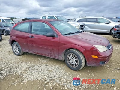 Czwarte zdjęcie samochodu z boku: 2007 FORD FOCUS ZX3 VIN:1FAHP31NX7W316139 - miniatura