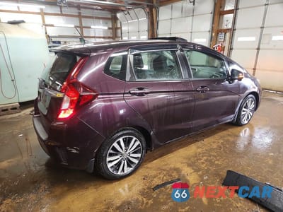 Trzecie zdjęcie samochodu z tyłu: 2015 HONDA FIT EX VIN:3HGGK5H88FM747577 - miniatura