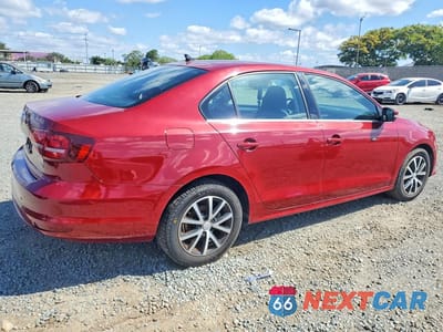 Trzecie zdjęcie samochodu z tyłu: 2018 VOLKSWAGEN JETTA SE VIN:3VWDB7AJ6JM220735 - miniatura
