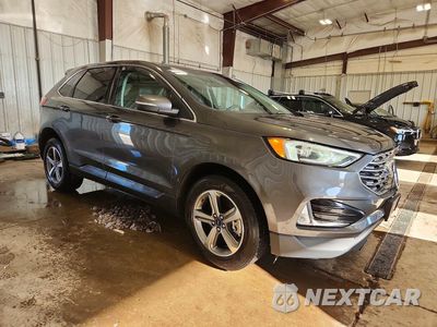Czwarte zdjęcie samochodu z boku: 2020 FORD EDGE SEL VIN:2FMPK4J90LBB12843 - miniatura