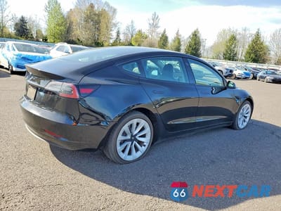 Trzecie zdjęcie samochodu z tyłu: 2022 TESLA MODEL 3 VIN:5YJ3E1EA5NF370942 - miniatura