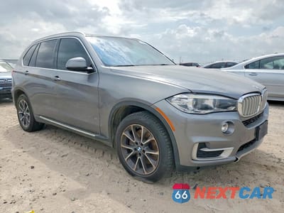 Czwarte zdjęcie samochodu z boku: 2014 BMW X5 XDRIVE50I VIN:5UXKR6C50E0C03214 - miniatura