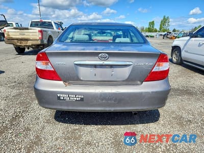 Zdjęcie 6 z 11 samochodu: 2003 TOYOTA CAMRY XLE VIN:4T1BE30K93U708625 - miniatura