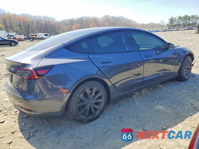 Trzecie zdjęcie samochodu z tyłu: 2023 TESLA MODEL 3 VIN:5YJ3E1EA4PF690949 - miniatura