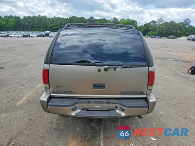 Zdjęcie 6 z 13 samochodu: 2001 CHEVROLET BLAZER VIN:1GNCS13W812184386 - miniatura