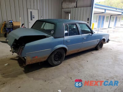 Trzecie zdjęcie samochodu z tyłu: 1987 OLDSMOBILE CUTLASS SUPREME BROUGHAM VIN:2G3GM51Y4H2335843 - miniatura