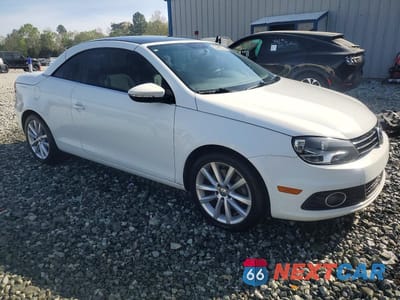 Czwarte zdjęcie samochodu z boku: 2015 VOLKSWAGEN EOS KOMFORT VIN:WVWBW8AH9FV001055 - miniatura