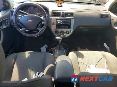 Zdjęcie 8 z 12 samochodu: 2005 FORD FOCUS ZX5 VIN:3FAHP37NX5R140796 - miniatura