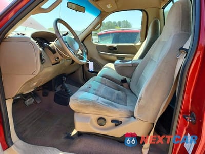 Zdjęcie 7 z 12 samochodu: 2001 FORD F150 VIN:1FTRF18L11NB46258 - miniatura