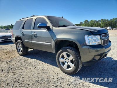 Czwarte zdjęcie samochodu z boku: 2011 CHEVROLET TAHOE C1500 LTZ VIN:1GNSCCE07BR212121 - miniatura