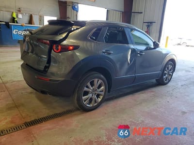 Trzecie zdjęcie samochodu z tyłu: 2023 MAZDA CX-30 PREFERRED VIN:3MVDMBCM7PM549099 - miniatura