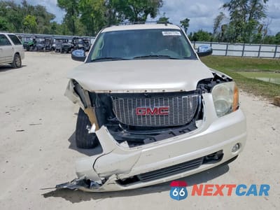 Piąte zdjęcie samochodu w środku: 2011 GMC YUKON XL C1500 SLT VIN:1GKS1KE06BR202273 - miniatura