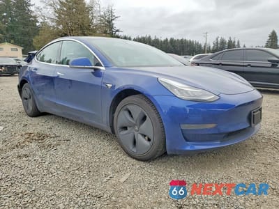 Czwarte zdjęcie samochodu z boku: 2020 TESLA MODEL 3 VIN:5YJ3E1EA1LF739809 - miniatura