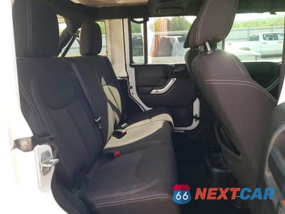 Zdjęcie 11 z 13 samochodu: 2013 JEEP WRANGLER UNLIMITED SAHARA VIN:1C4BJWEG5DL629403 - miniatura