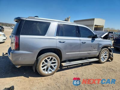 Trzecie zdjęcie samochodu z tyłu: 2018 GMC YUKON DENALI VIN:1GKS1CKJ8JR312601 - miniatura