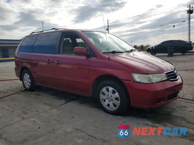 Czwarte zdjęcie samochodu z boku: 2004 HONDA ODYSSEY EXL VIN:5FNRL18704B143656 - miniatura