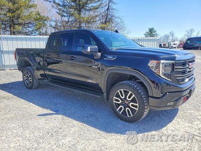 Czwarte zdjęcie samochodu z boku: 2022 GMC SIERRA K1500 AT4 VIN:3GTUUEET3NG604554 - miniatura