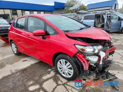Czwarte zdjęcie samochodu z boku: 2016 HONDA FIT LX VIN:JHMGK5H51GX006881 - miniatura