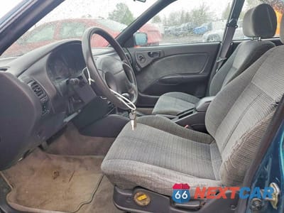 Zdjęcie 7 z 12 samochodu: 1999 SUBARU LEGACY L VIN:4S3BK4351X7310001 - miniatura