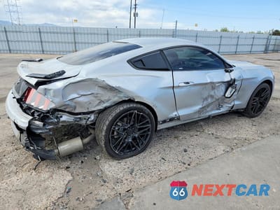 Trzecie zdjęcie samochodu z tyłu: 2017 FORD MUSTANG VIN:1FA6P8AM3H5311075 - miniatura