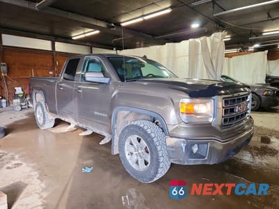 Czwarte zdjęcie samochodu z boku: 2014 GMC SIERRA K1500 SLE VIN:1GTV2UEC7EZ159529 - miniatura