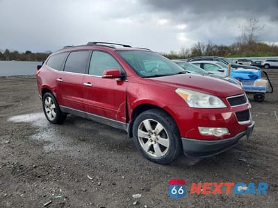 Czwarte zdjęcie samochodu z boku: 2012 CHEVROLET TRAVERSE LT VIN:1GNKRGED9CJ327277 - miniatura
