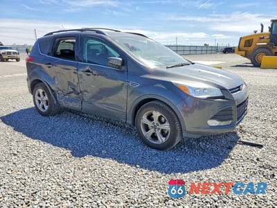 Czwarte zdjęcie samochodu z boku: 2015 FORD ESCAPE SE VIN:1FMCU9G97FUA78623 - miniatura