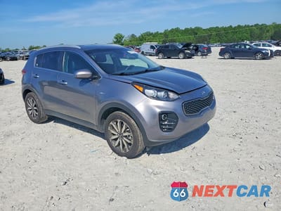 Czwarte zdjęcie samochodu z boku: 2017 KIA SPORTAGE EX VIN:KNDPNCAC1H7077022 - miniatura