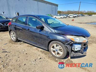 Czwarte zdjęcie samochodu z boku: 2012 FORD FOCUS SE VIN:1FAHP3K2XCL365597 - miniatura
