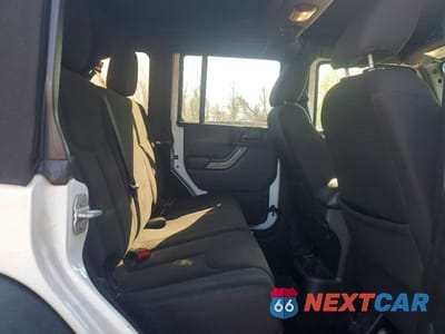 Zdjęcie 11 z 13 samochodu: 2016 JEEP WRANGLER UNLIMITED SPORT VIN:1C4BJWDG1GL248072 - miniatura