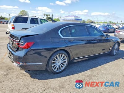 Trzecie zdjęcie samochodu z tyłu: 2020 BMW 740 I VIN:WBA7T2C01LGL17923 - miniatura