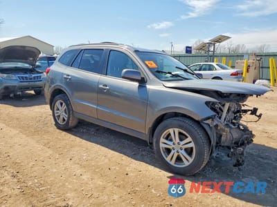 Czwarte zdjęcie samochodu z boku: 2010 HYUNDAI SANTA FE SE VIN:5NMSH4AG5AH407768 - miniatura