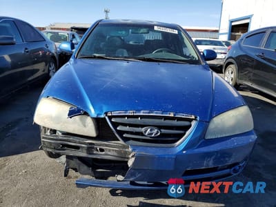 Piąte zdjęcie samochodu w środku: 2005 HYUNDAI ELANTRA GLS VIN:KMHDN46D65U037960 - miniatura