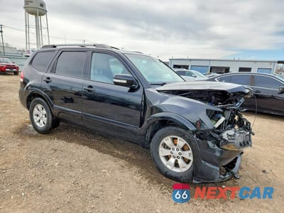 Czwarte zdjęcie samochodu z boku: 2009 KIA BORREGO LX VIN:KNDJJ741X95024691 - miniatura