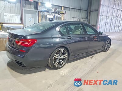 Trzecie zdjęcie samochodu z tyłu: 2019 BMW 740 I VIN:WBA7E2C58KB217299 - miniatura