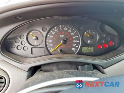 Zdjęcie 9 z 13 samochodu: 2004 FORD FOCUS LX VIN:1FAFP33P14W132192 - miniatura