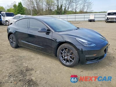 Czwarte zdjęcie samochodu z boku: 2023 TESLA MODEL 3 VIN:5YJ3E1EA0PF689748 - miniatura