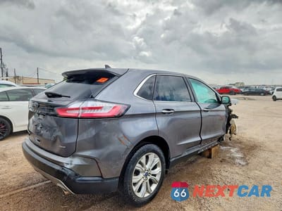 Trzecie zdjęcie samochodu z tyłu: 2022 FORD EDGE TITANIUM VIN:2FMPK4K93NBA32891 - miniatura